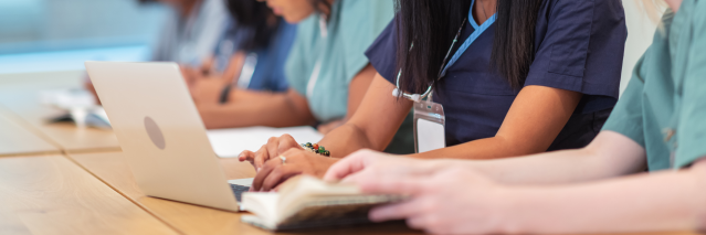 Nurses using laptops